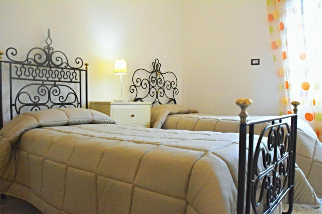 Postel nebo postele na pokoji v ubytování MIRA HOUSE