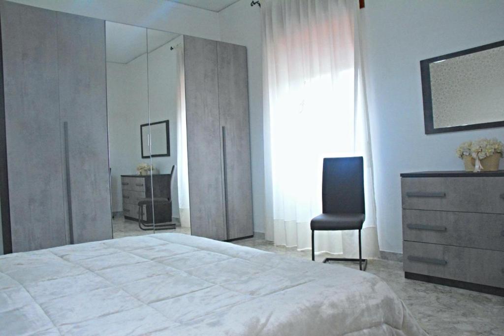 Postel nebo postele na pokoji v ubytování MIRA HOUSE