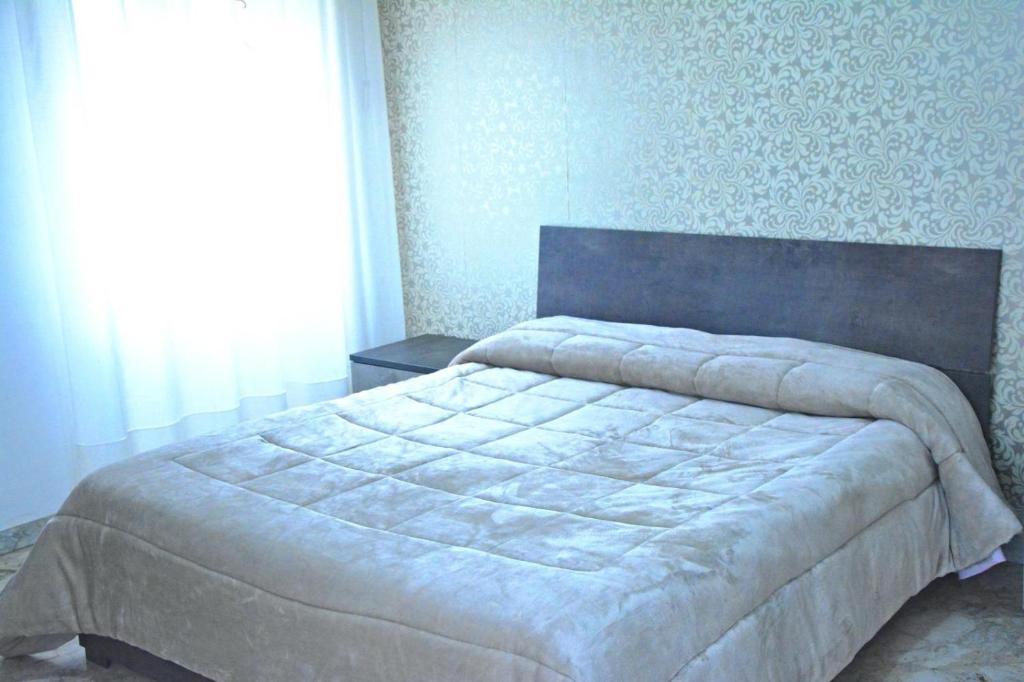 Postel nebo postele na pokoji v ubytování MIRA HOUSE