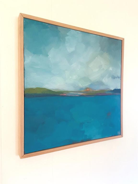 a painting of the ocean on a wall at Wisteria Guest House in Ganges