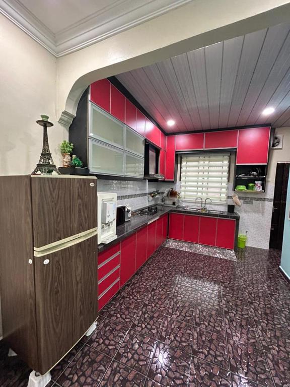 Kuchyň nebo kuchyňský kout v ubytování HomestayMuslim Safiyya