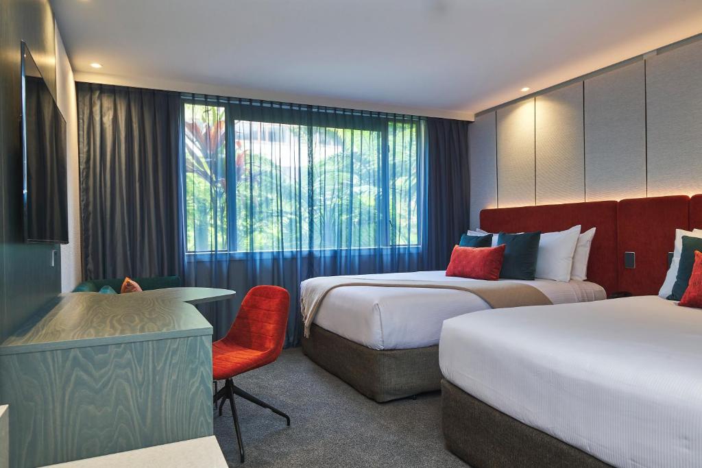 Postel nebo postele na pokoji v ubytování Millennium Hotel Rotorua