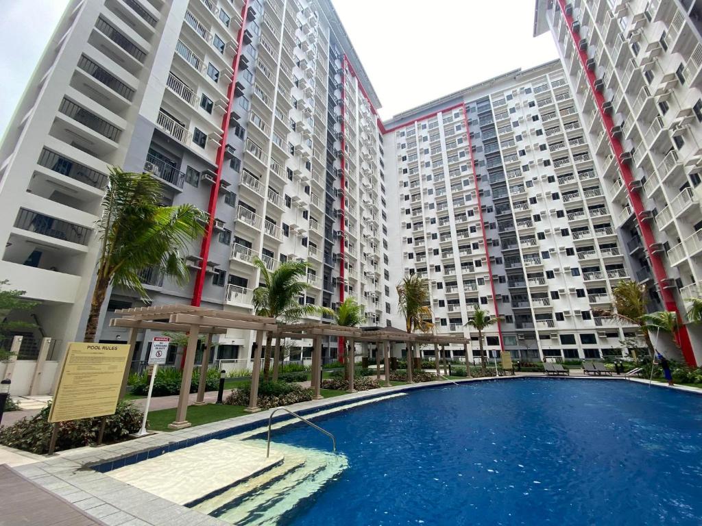 Bazén v ubytování Casa Herminia at Bloom Residences 2Br nebo v jeho okolí