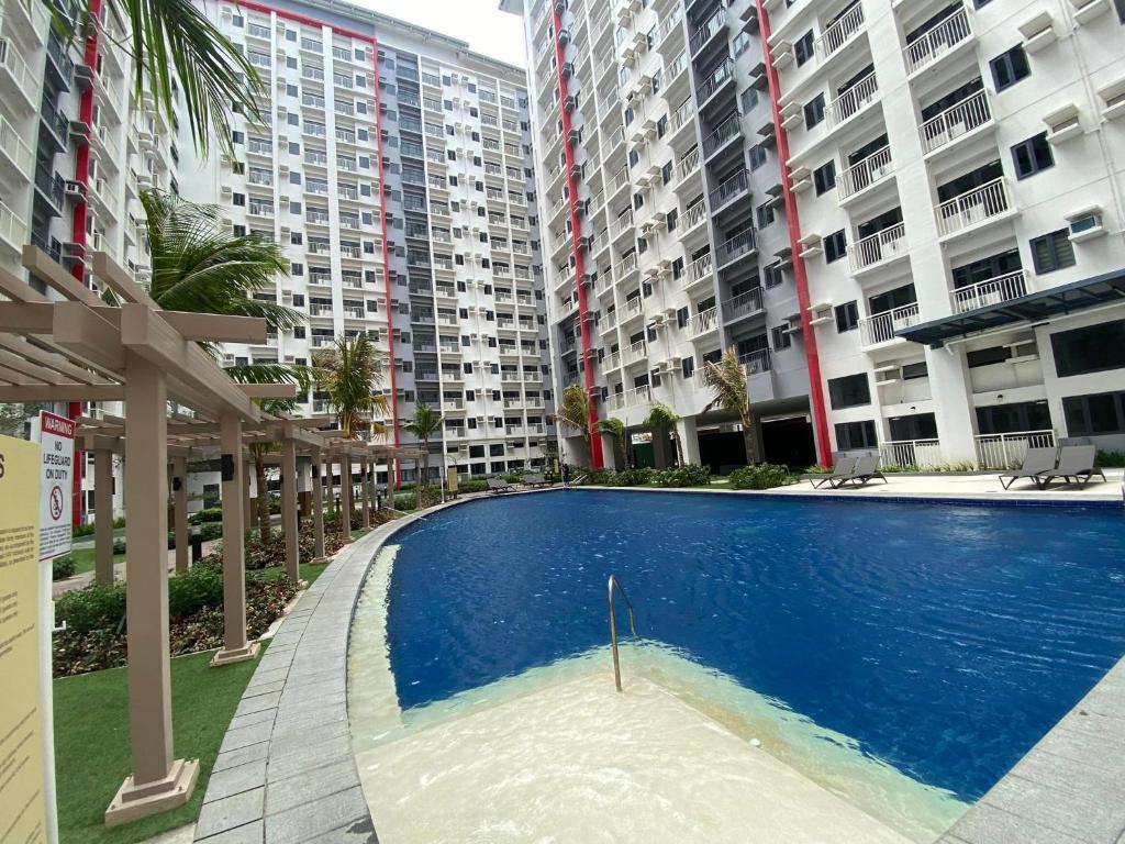 Bazén v ubytování Casa Herminia at Bloom Residences 2Br nebo v jeho okolí