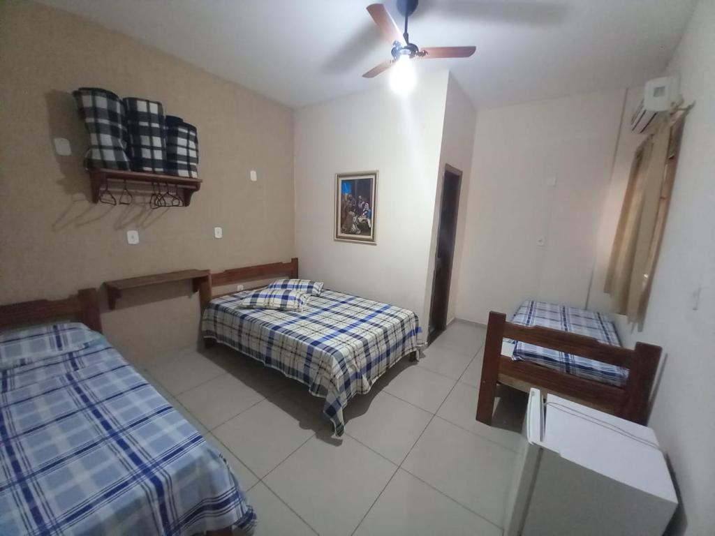 Кровать или кровати в номере Hotel Monte Belo Palace