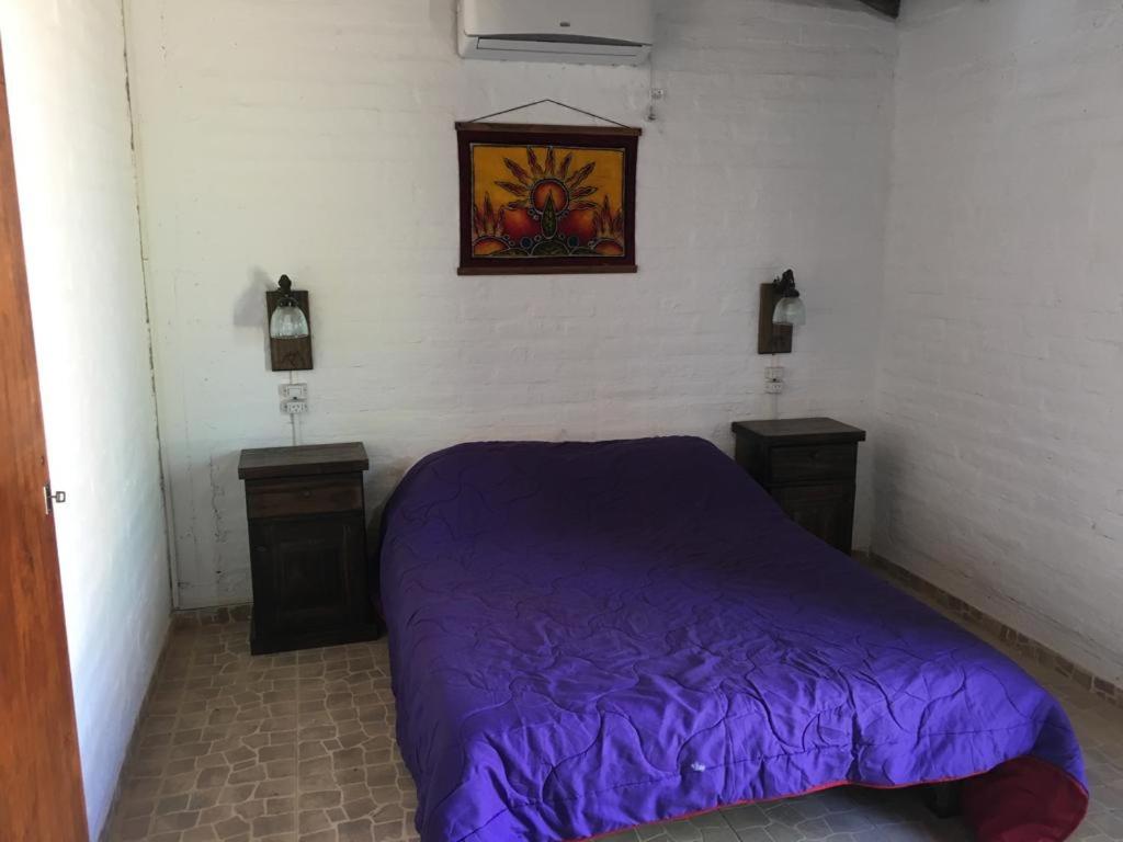 Ένα ή περισσότερα κρεβάτια σε δωμάτιο στο El Gran Tacú - El Descanso