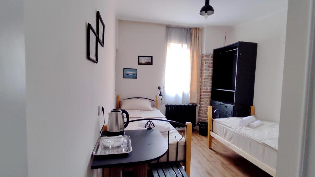 Postel nebo postele na pokoji v ubytování 9 Doors