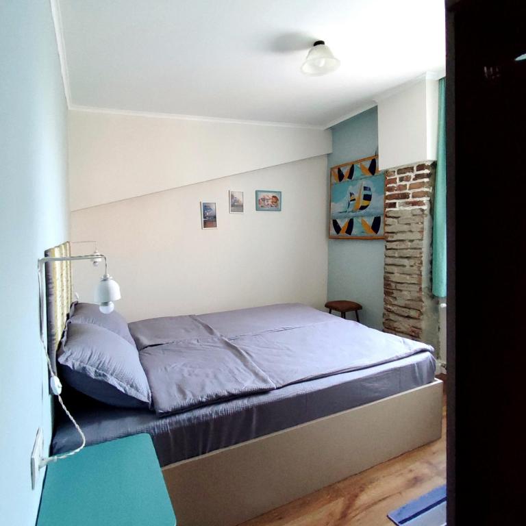 Postel nebo postele na pokoji v ubytování 9 Doors