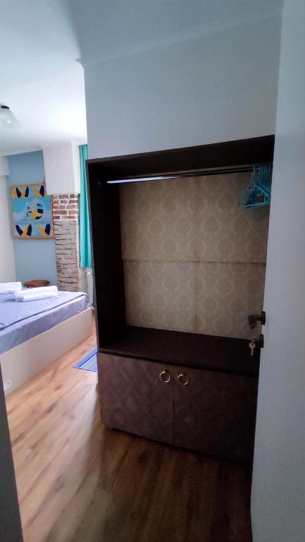 Postel nebo postele na pokoji v ubytování 9 Doors