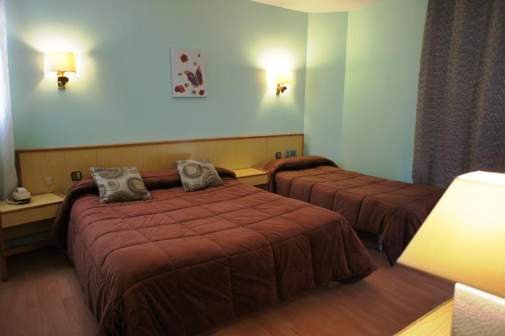 Letto o letti in una camera di Hotel La Planada