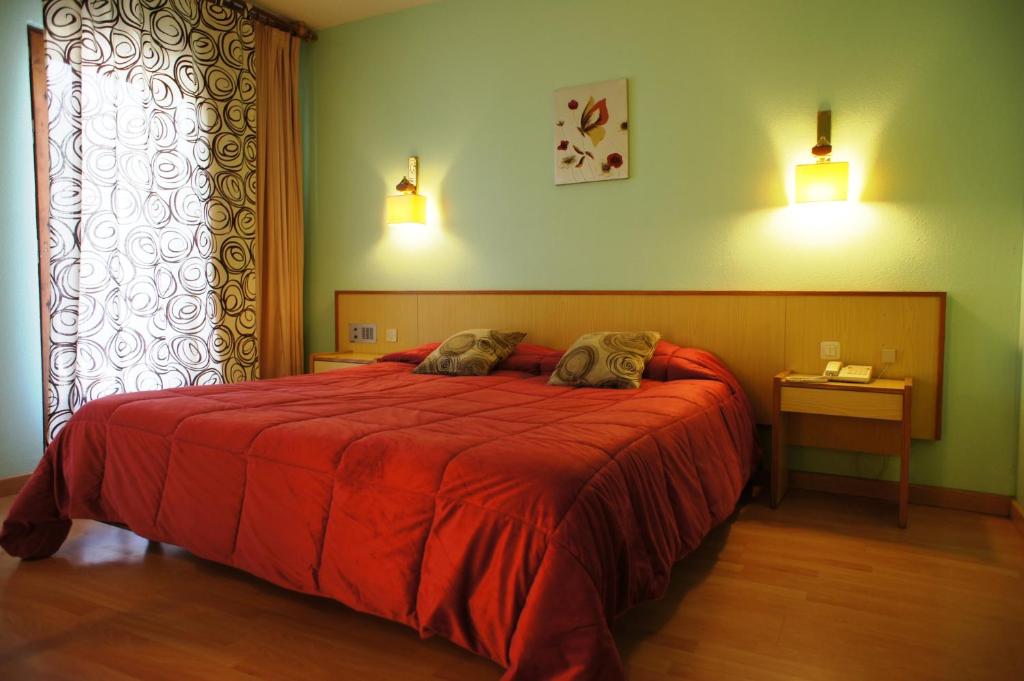 Letto o letti in una camera di Hotel La Planada