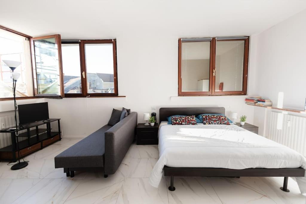 Lova arba lovos apgyvendinimo įstaigoje Santa Marta Luxury Apartment Duomo