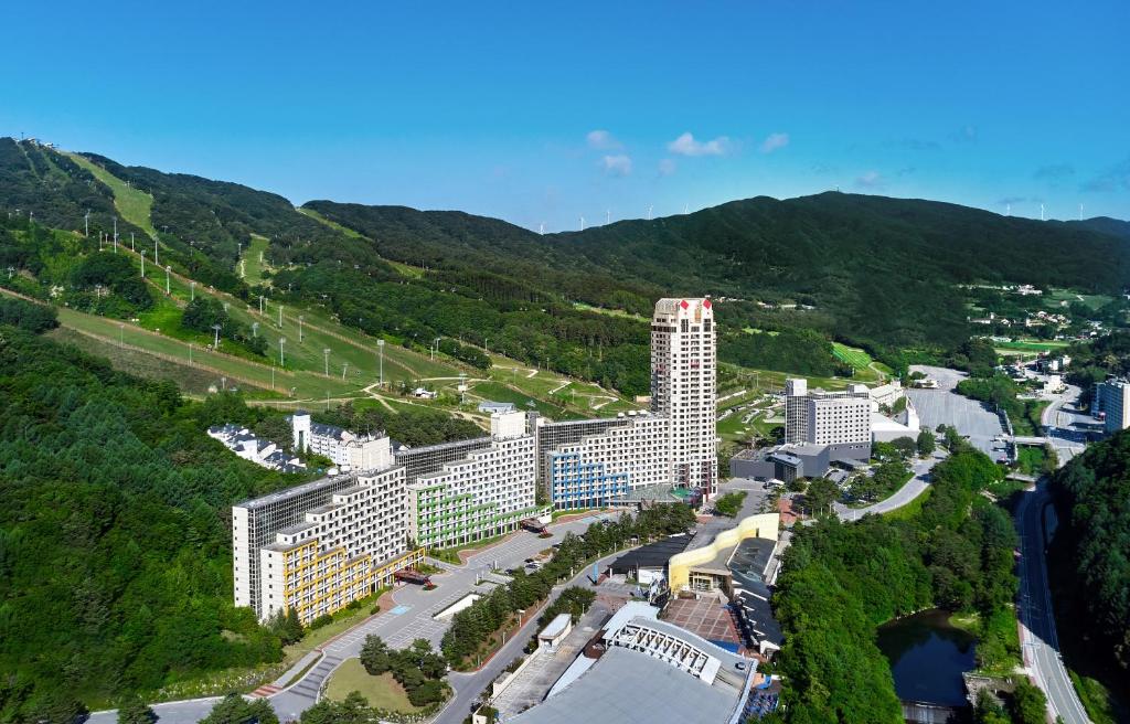 an aerial view of a city with a mountain at Phoenix Resort Pyeongchang in Pyeongchang