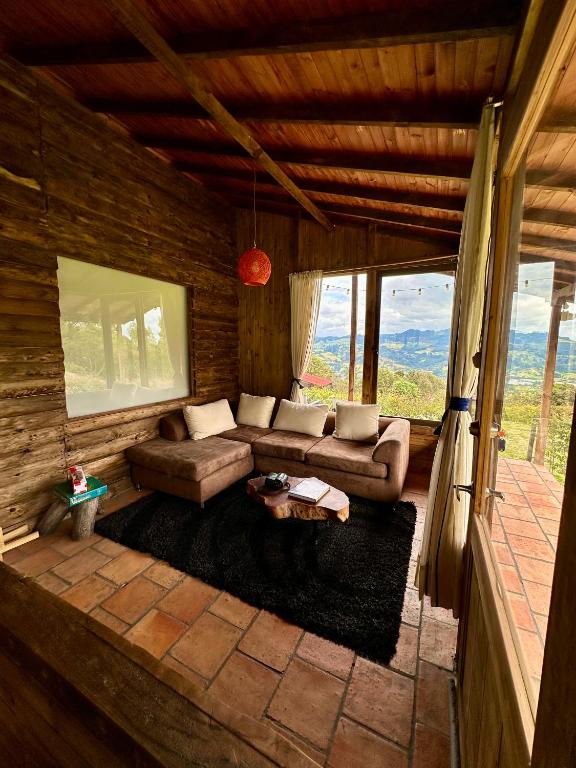 Posezení v ubytování Refugio Aventura, hermosa cabaña y acogedores glampings en Tabio, cerca a Bogotá