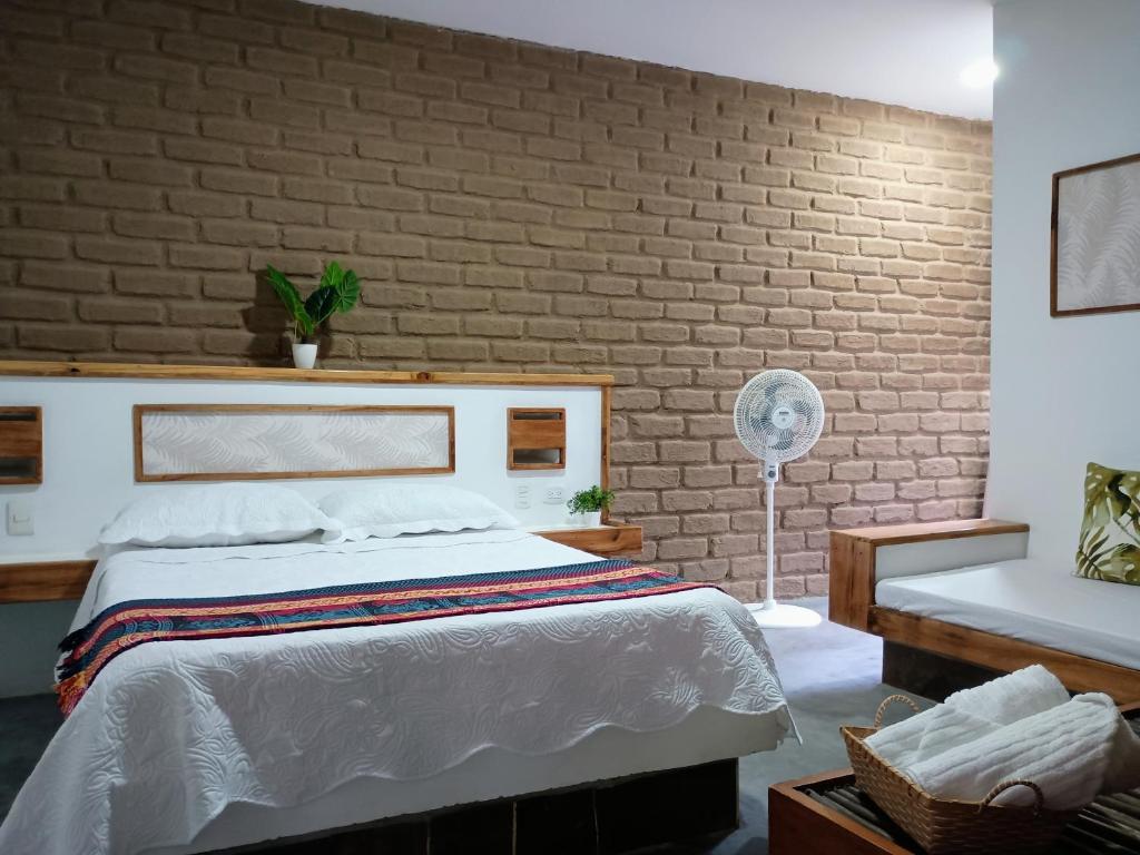 Postel nebo postele na pokoji v ubytování CASA RAÍZ RÍO ANCHO