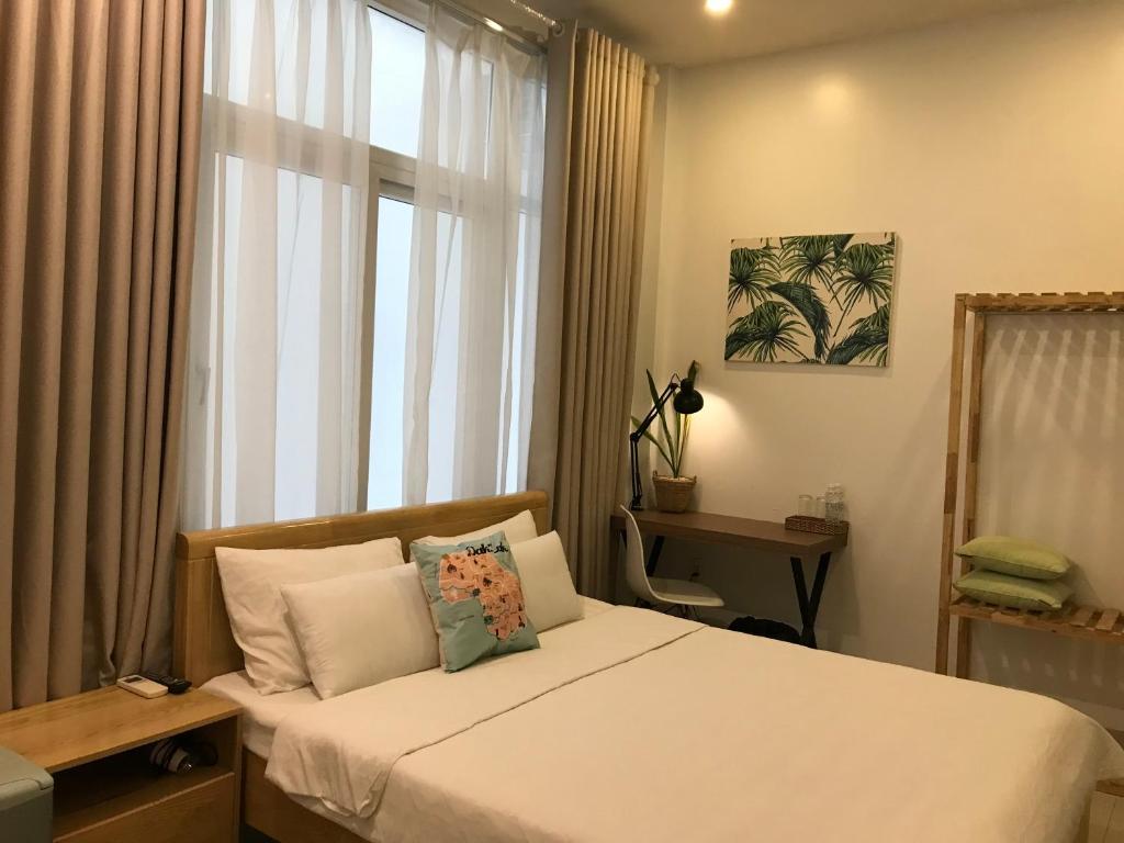 Giường trong phòng chung tại The Highland House