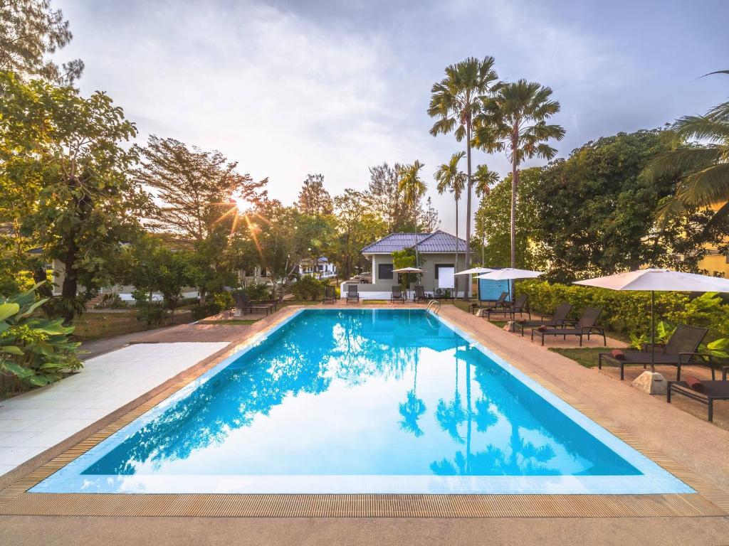 an image of a swimming pool at a house at Isara Nai Yang resort in Nai Yang Beach