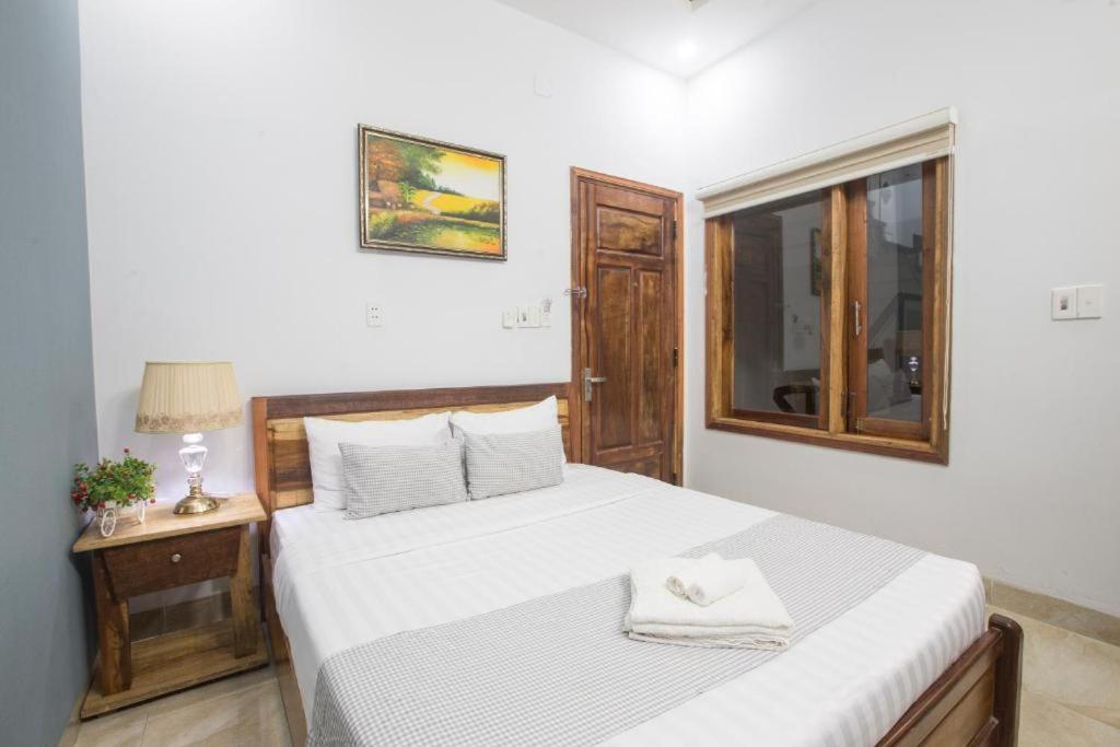 Postel nebo postele na pokoji v ubytování Lis Hotel