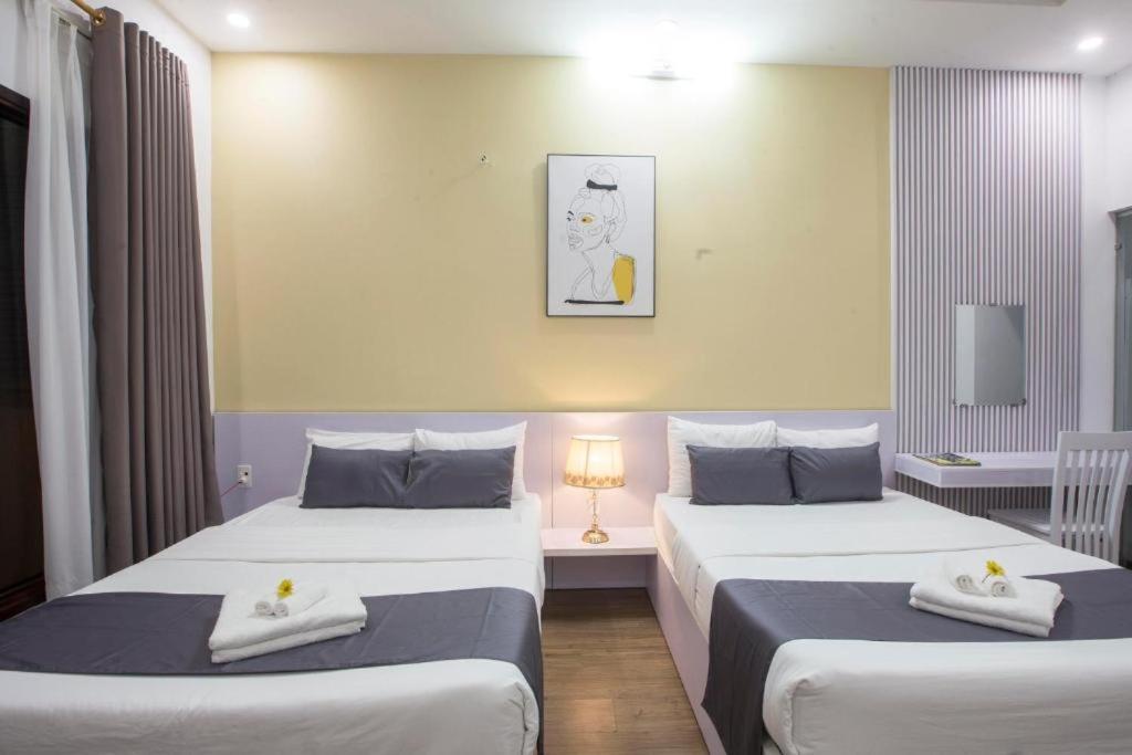 Postel nebo postele na pokoji v ubytování Lis Hotel