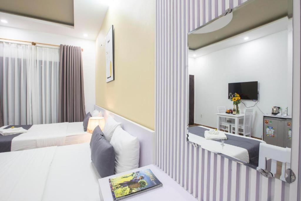 Postel nebo postele na pokoji v ubytování Lis Hotel