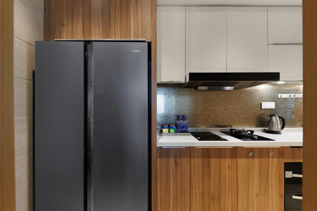 Kuchyň nebo kuchyňský kout v ubytování Doria Home International Apartment -Guangzhou Huijin IFC Keyun Road Metro Branch-Canton Fair Free Shuttle