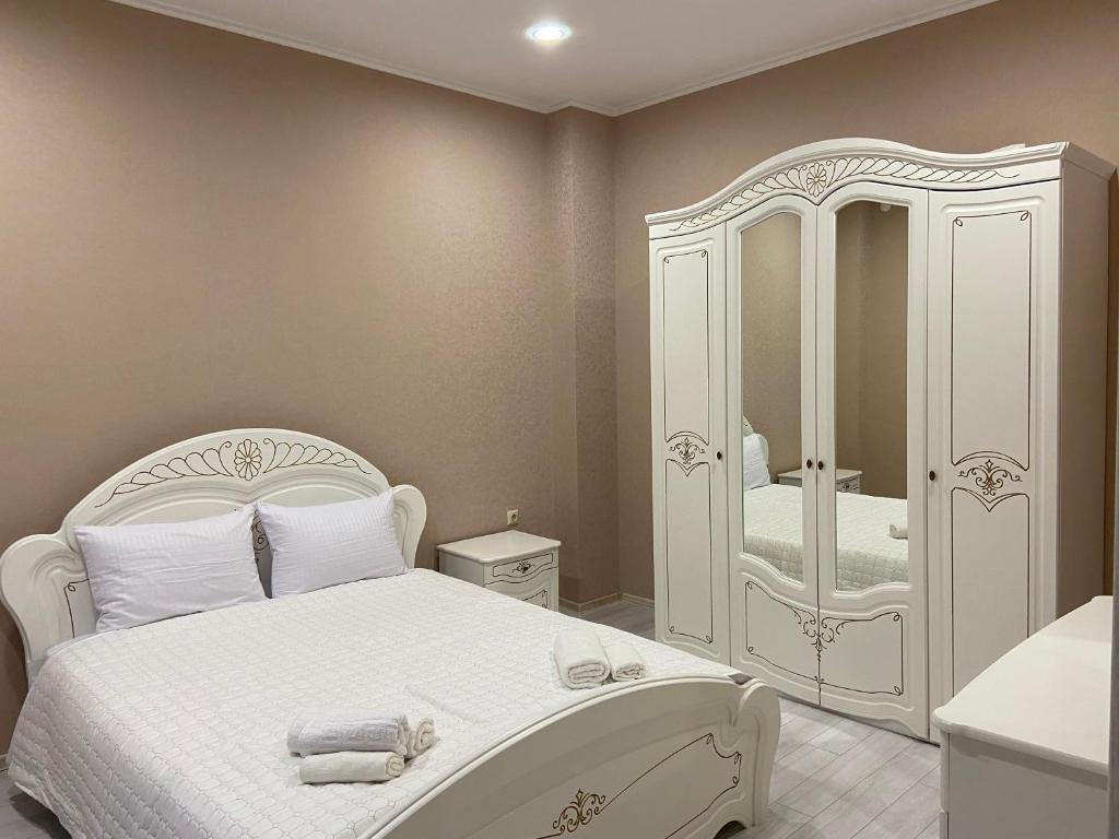 Postel nebo postele na pokoji v ubytování Astoria Hotel