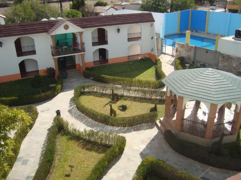 an aerial view of a house with a garden at Hotel Santa Barbara in Huichapan