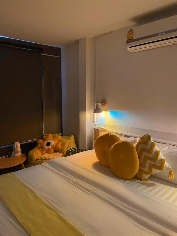 Postel nebo postele na pokoji v ubytování 17Stories 1