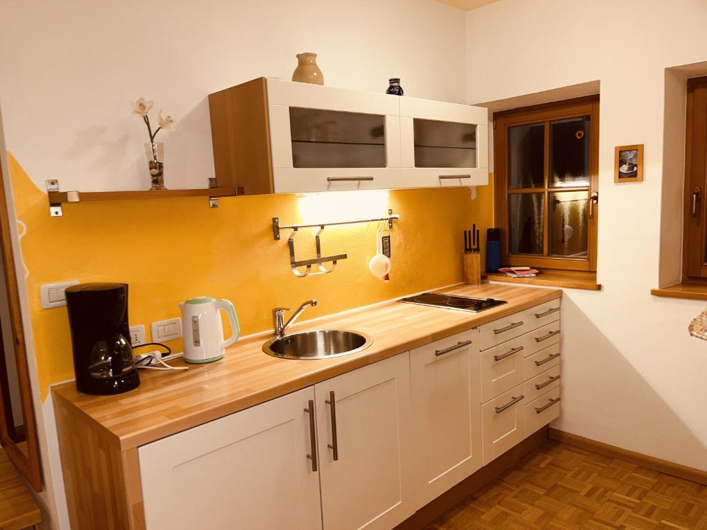 Kuchyň nebo kuchyňský kout v ubytování Residence Zirmer Wohnung Sonne