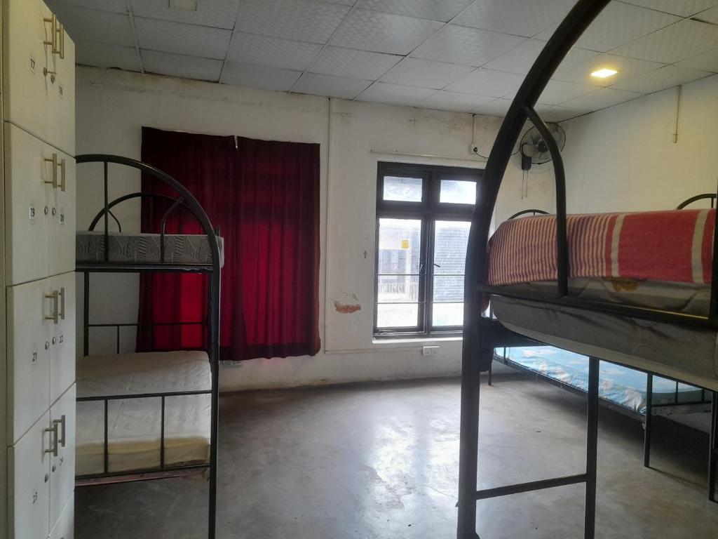 Postel nebo postele na pokoji v ubytování City View Hostel