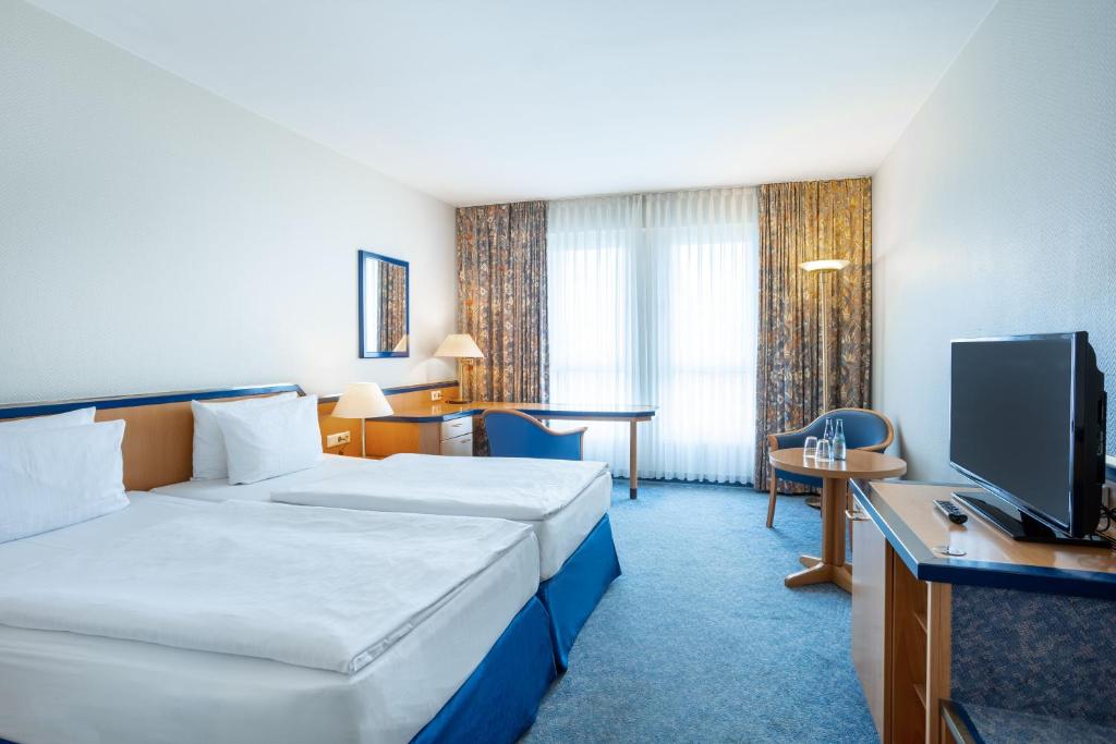 TV a/nebo společenská místnost v ubytování HI Hotel International Hamburg