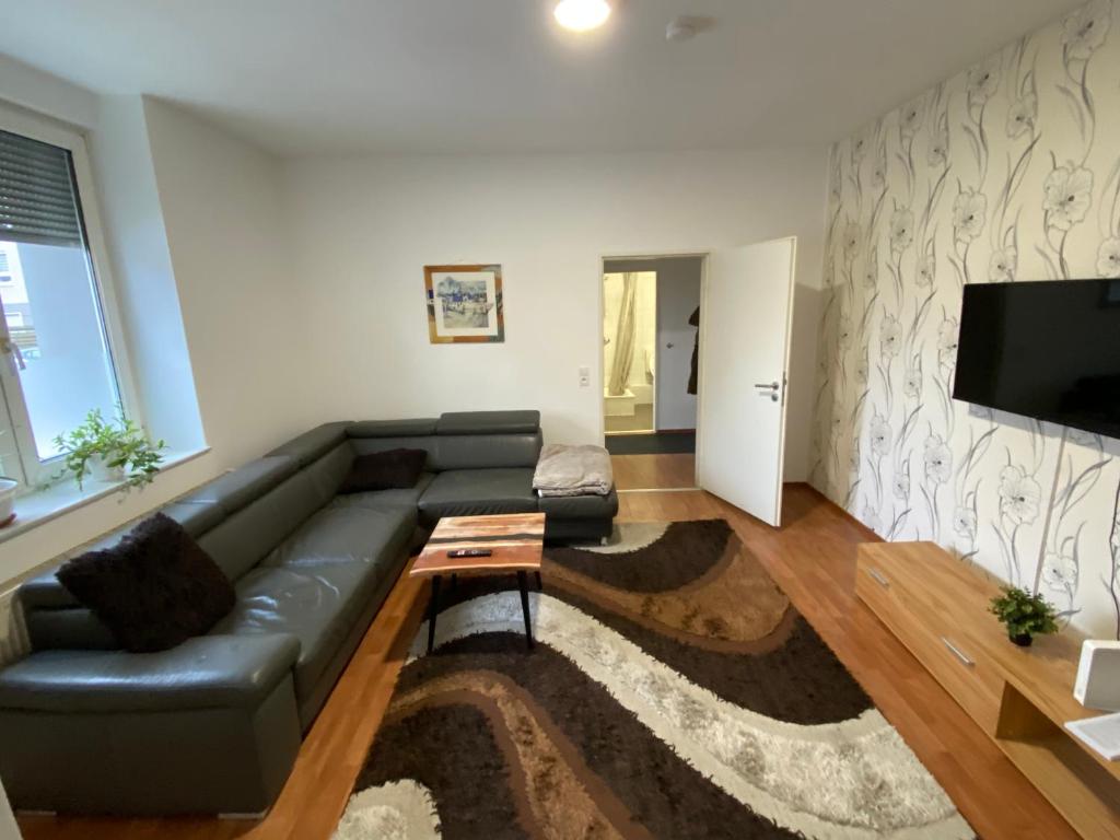 TV a/nebo společenská místnost v ubytování Apartment bei Michael Bochum