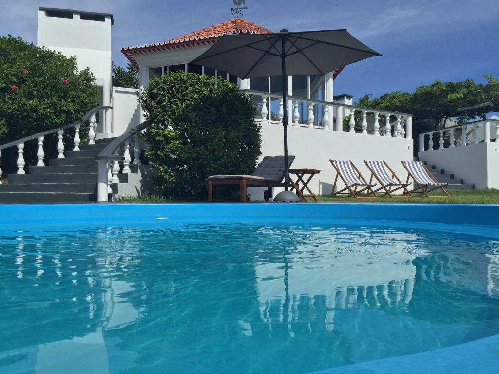 Bazén v ubytování Quinta das Rosas Villas nebo v jeho okolí