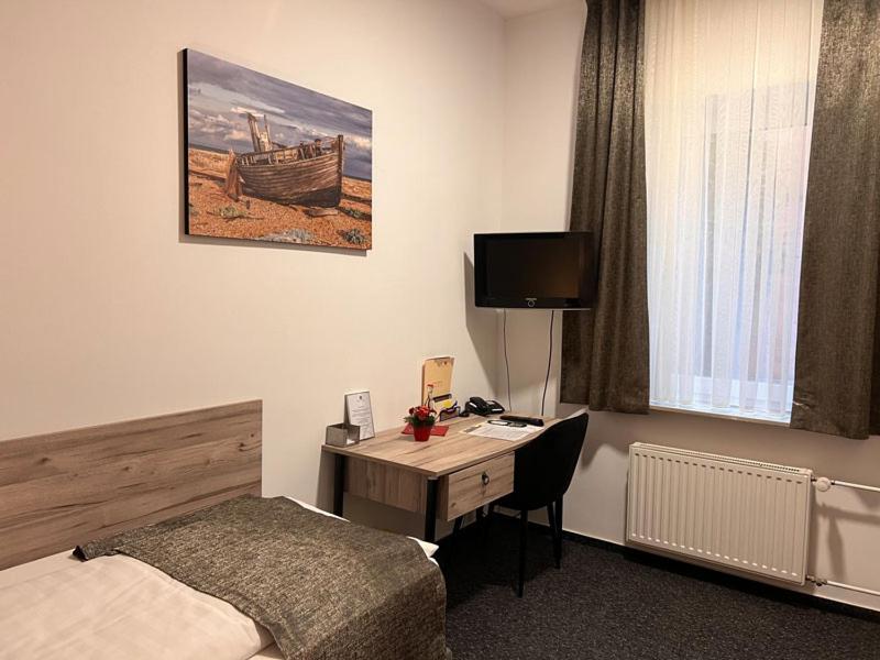 TV a/nebo společenská místnost v ubytování Hotel Dietrichsdorfer Hof