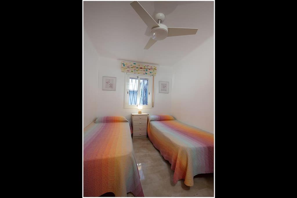 Postel nebo postele na pokoji v ubytování AT301 Apartamento a pocos metros de la playa de Altafulla