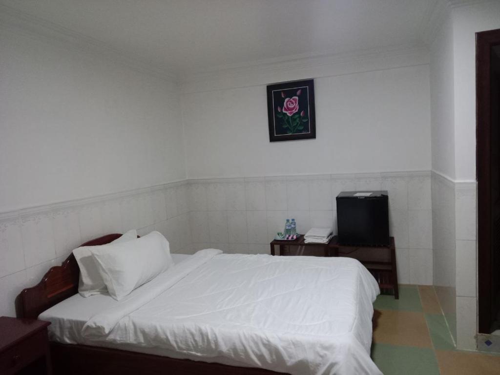 Postel nebo postele na pokoji v ubytování Centro Guest House