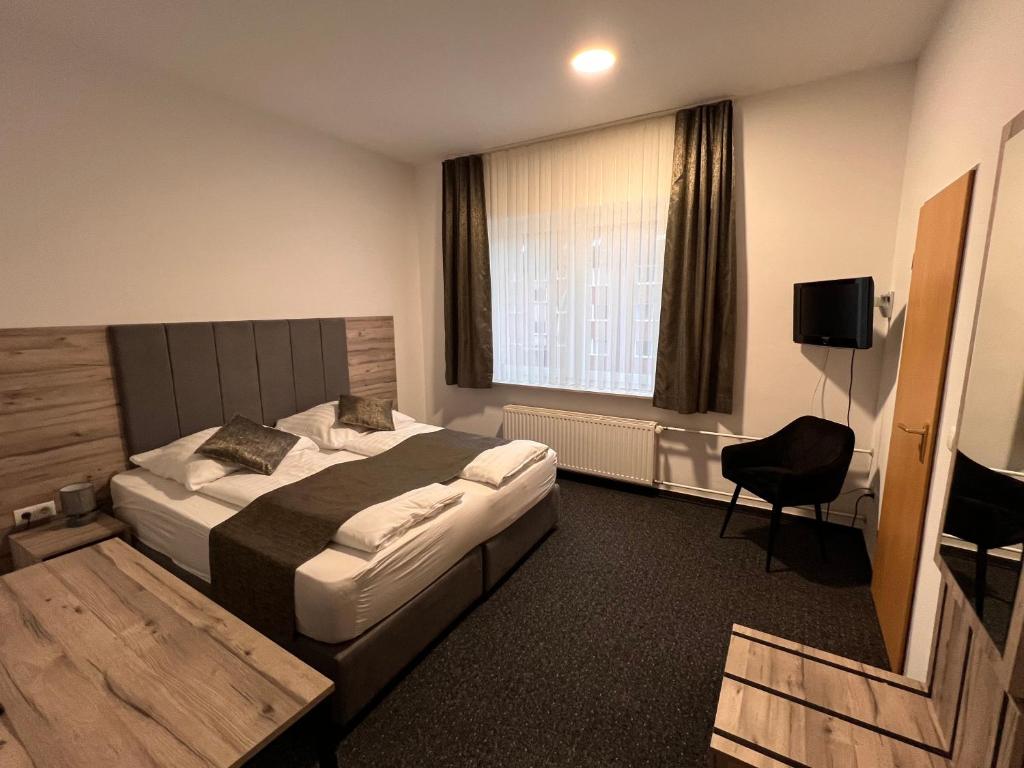 TV a/nebo společenská místnost v ubytování Hotel Dietrichsdorfer Hof