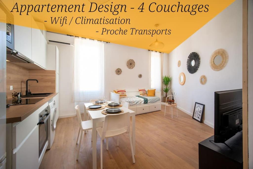 Il comprend une cuisine et un salon avec une table. dans l'établissement Le Cocon - Appart Neuf Clim Wifi 2 à 4 personnes, à Marseille