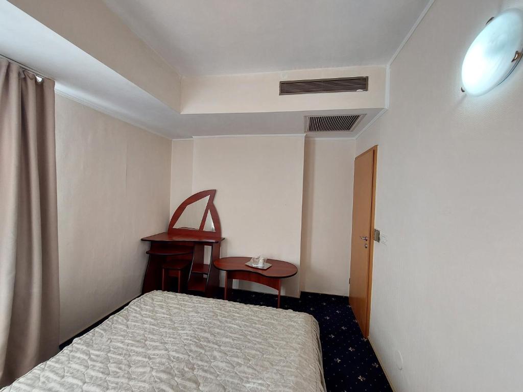 Postel nebo postele na pokoji v ubytování Hotel Egreta