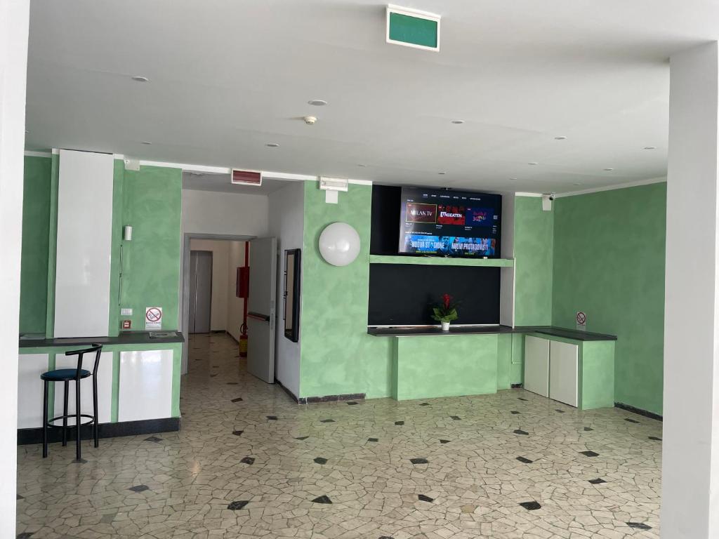 TV a/nebo společenská místnost v ubytování Hotel Rosa