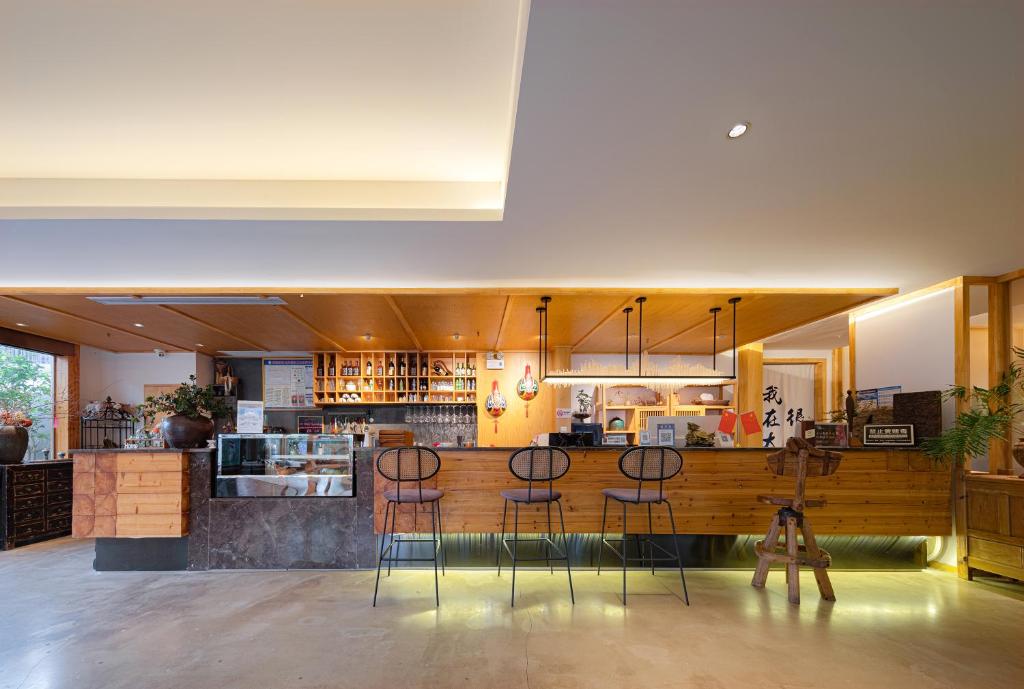 Lounge nebo bar v ubytování Wang Yun Residence Boutique Homestay Zhangjiajie