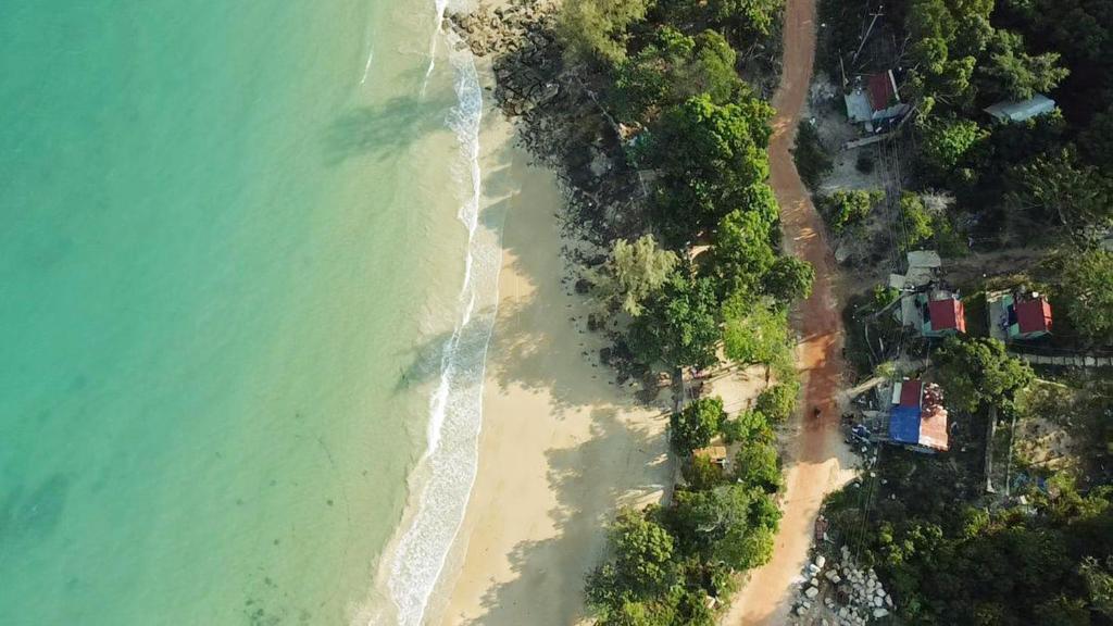 an aerial view of a beach and the ocean at Plankton Bungalow and Camping in Koh Rong Island