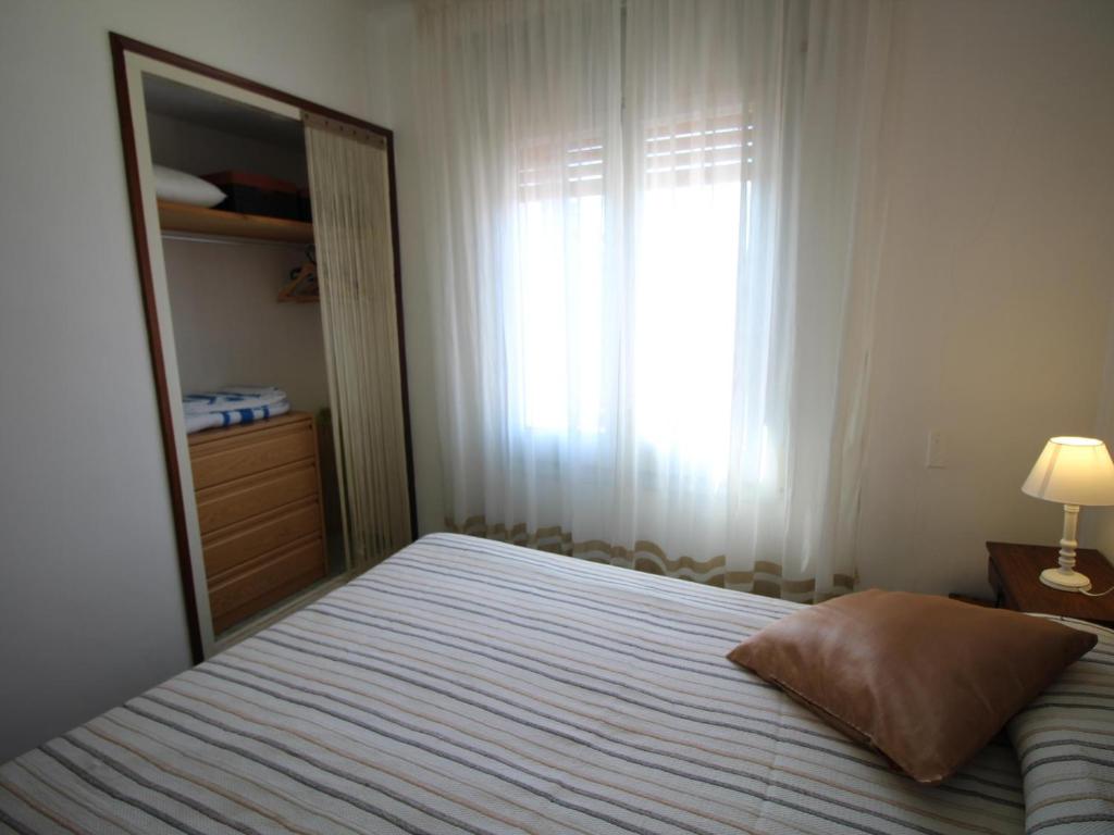 Posteľ alebo postele v izbe v ubytovaní Apartamento con gran terraza y vistas panorámicas, a 300 m de la playa. - ES-228-45