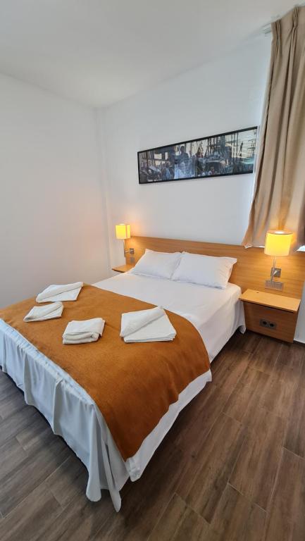 Postel nebo postele na pokoji v ubytování Jafar Resort 1