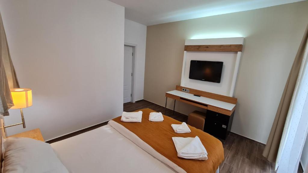 Postel nebo postele na pokoji v ubytování Jafar Resort 1