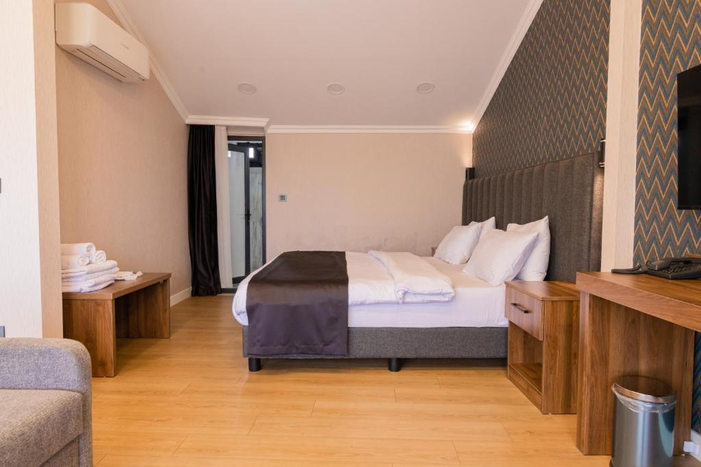 Postel nebo postele na pokoji v ubytování EÖB TAKSİM HOTEL