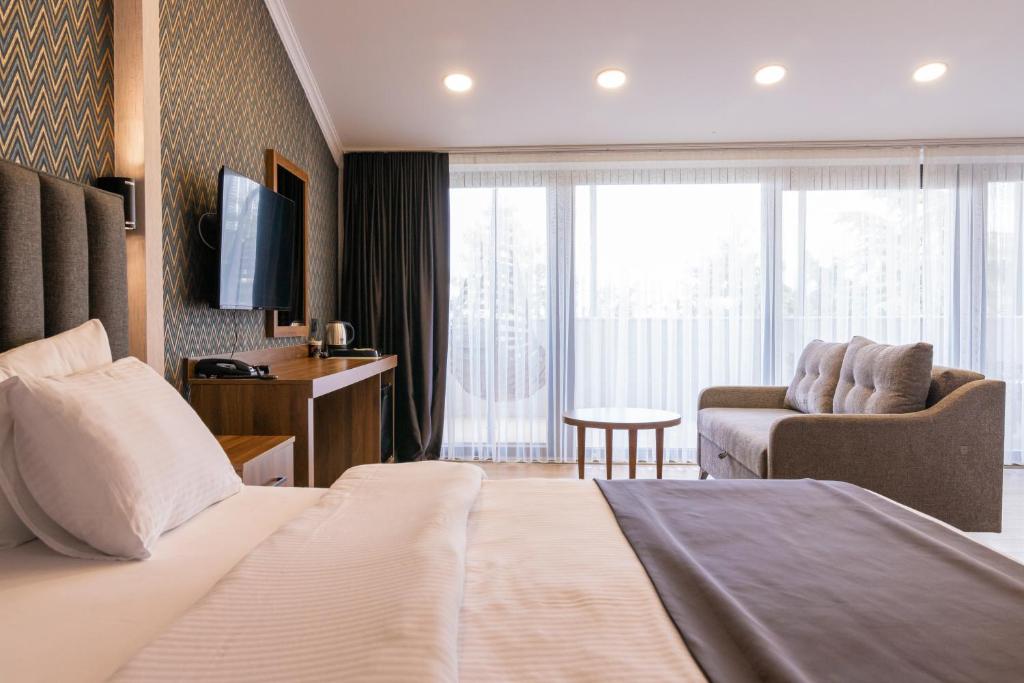 Postel nebo postele na pokoji v ubytování EÖB TAKSİM HOTEL