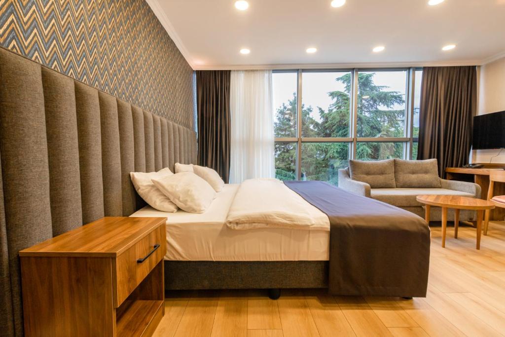 TV a/nebo společenská místnost v ubytování EÖB TAKSİM HOTEL