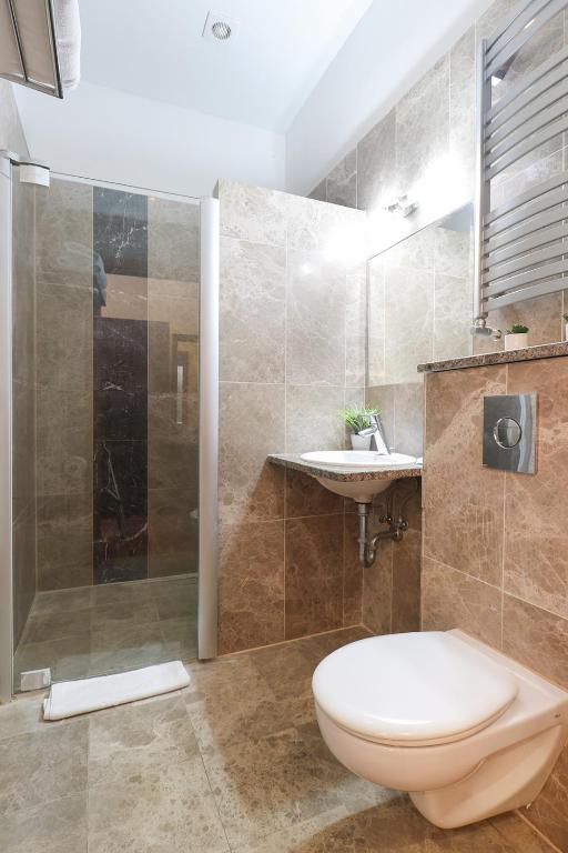 Koupelna v ubytování Atol Spa