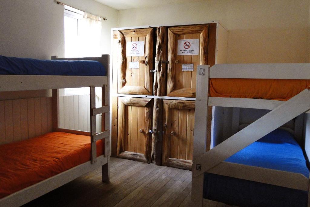 Postel nebo postele na pokoji v ubytování HOPA-Home Patagonia Hostel & Bar